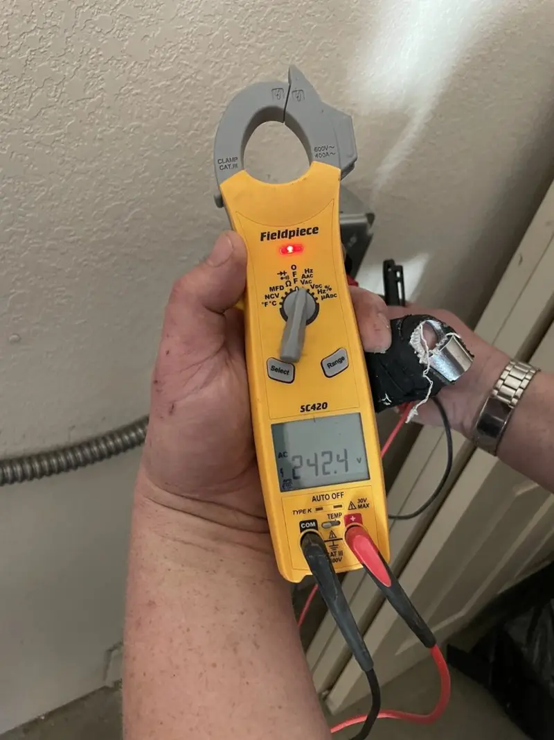 Voltage testing with clamp meter during Circuit Breaker Repair in Montoursville